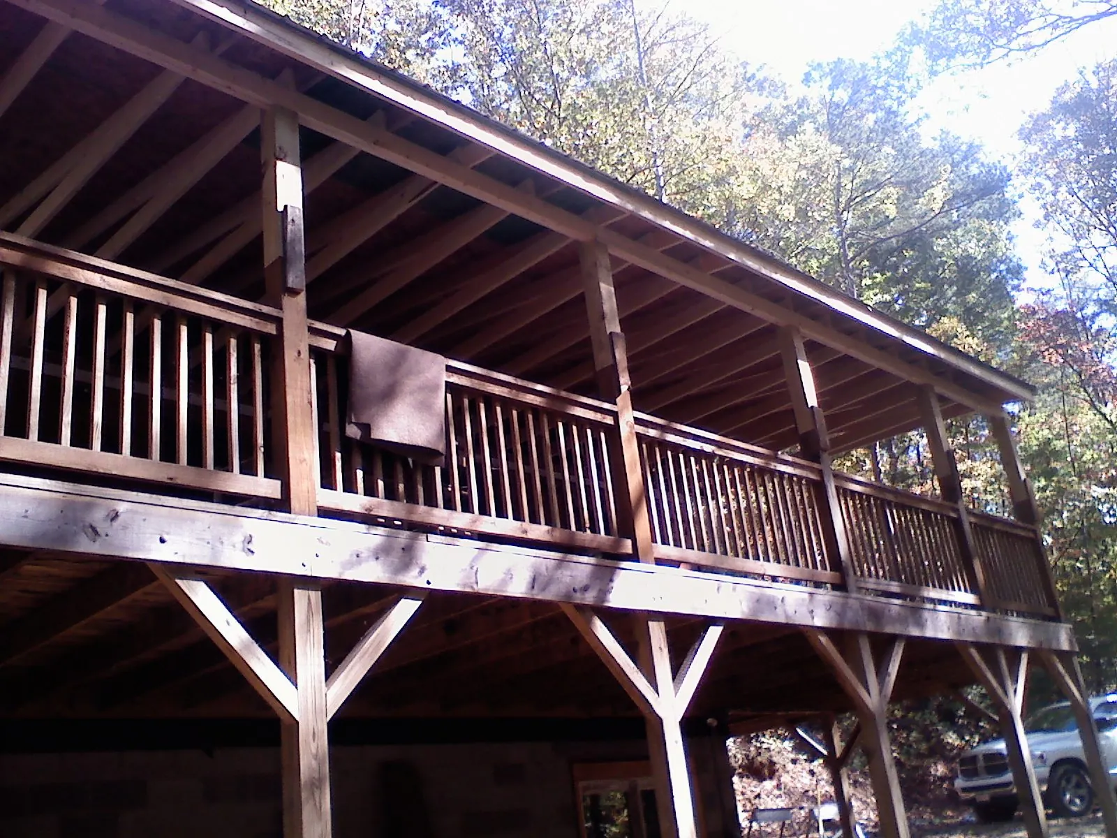 Timber framing under a new elevated porch and deck — Roof Leak Repair in Harwinton by Roofing Brothers